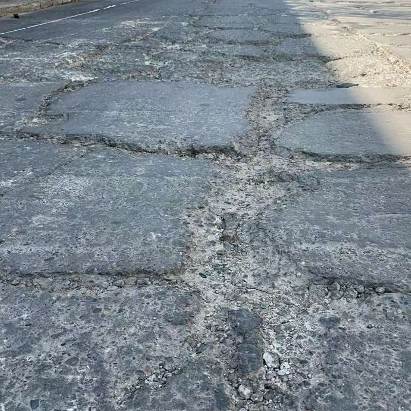 辉南路面起砂露石子修补料